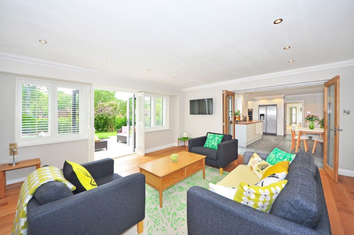 Open-plan kitchen and living room interior - common space where VOCs from cooking and furniture require advanced filtration