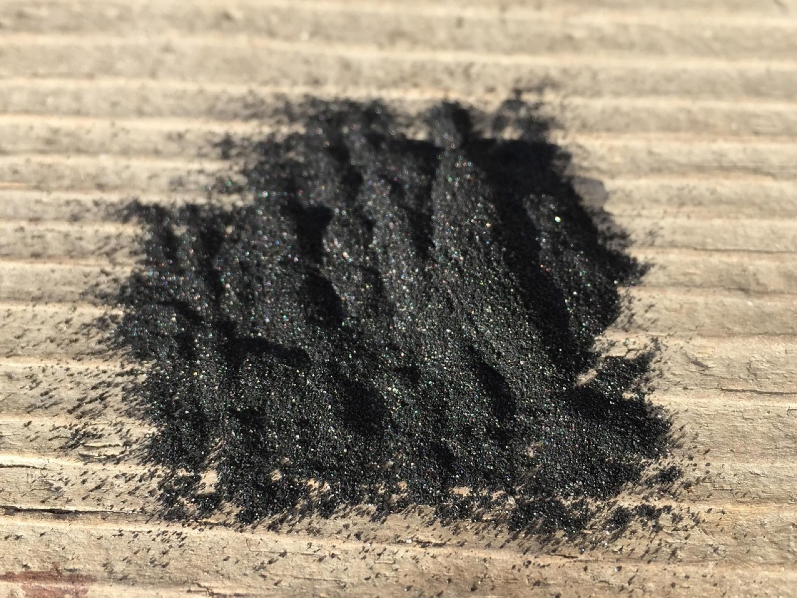 Activated carbon filter granules, the adsorbent material used in the Winix 5530's Filter Q carbon stage