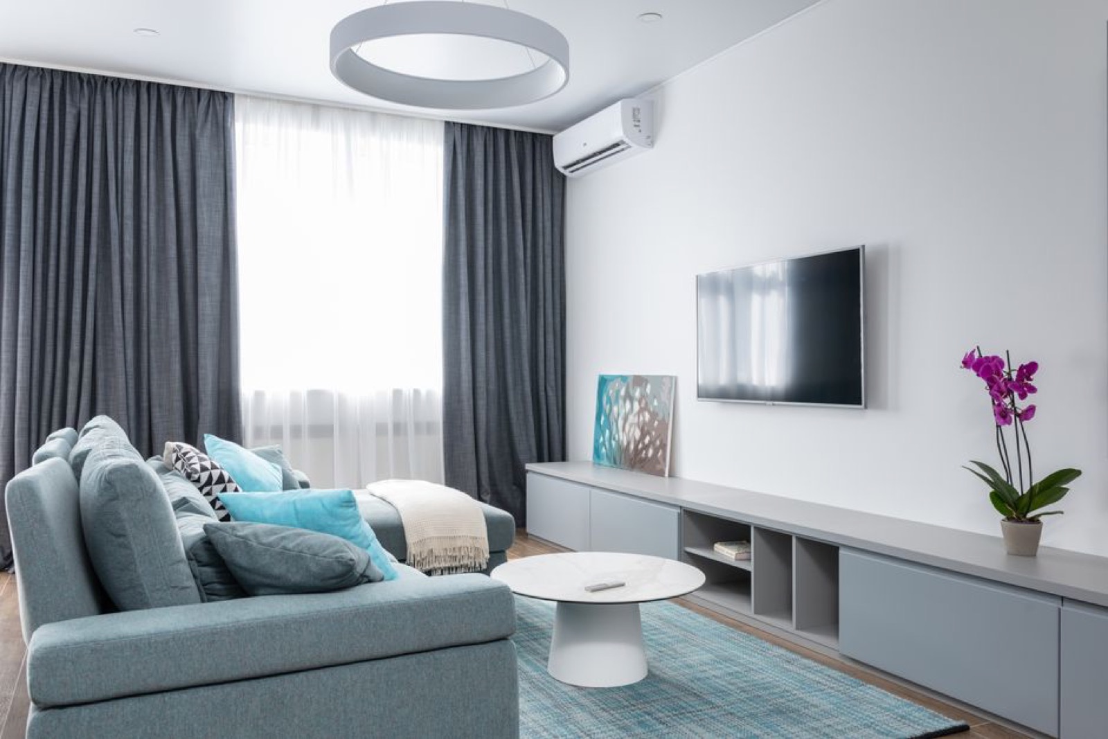 Modern living room with clean air and natural light - ideal environment for air purifier comparison