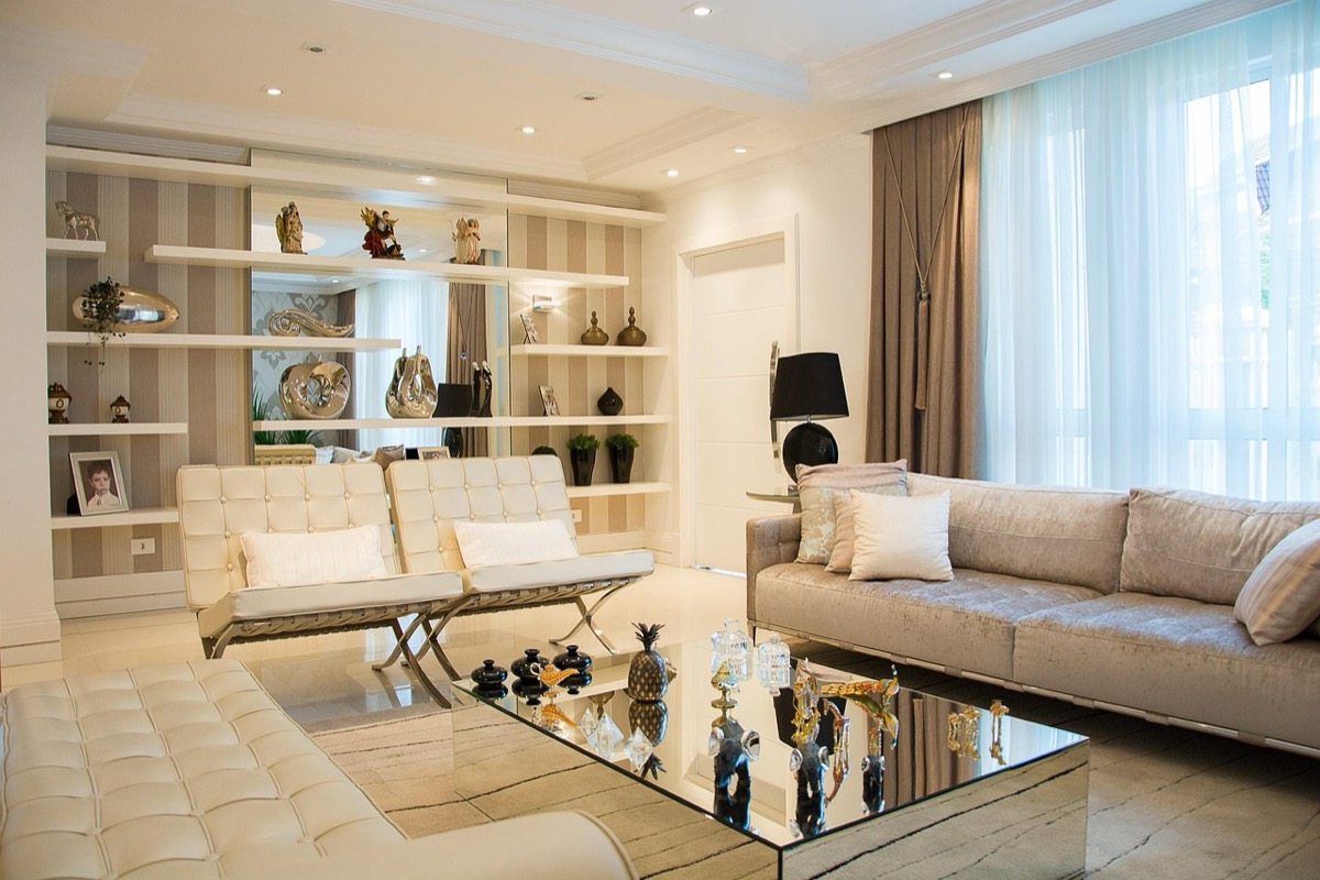 Bright living room with neutral furniture showing typical 400 square foot coverage area